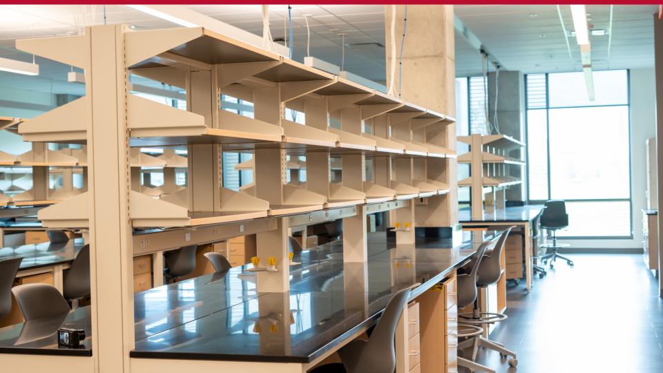 Open lab with benches and shelves with window